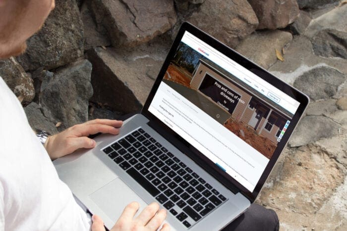 Man viewing Checkatrade article on his laptop